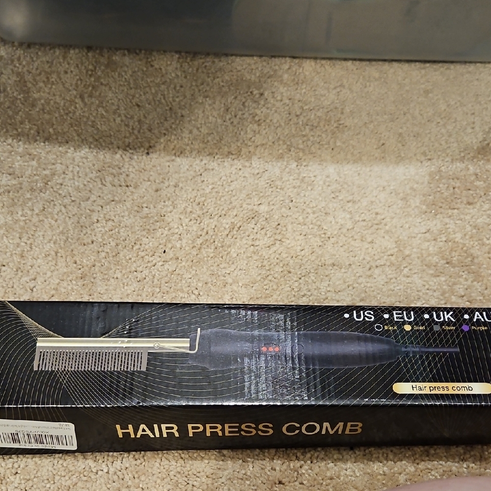 Source Unknown Black Hair Styling Tool